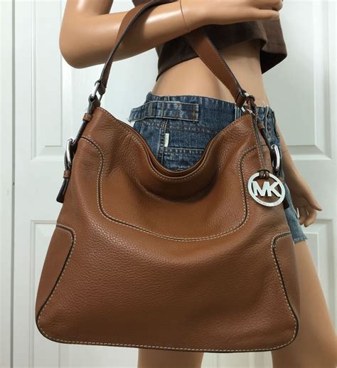 michael kors cheap handbags canada|Michael Kors Canada outlet bag.